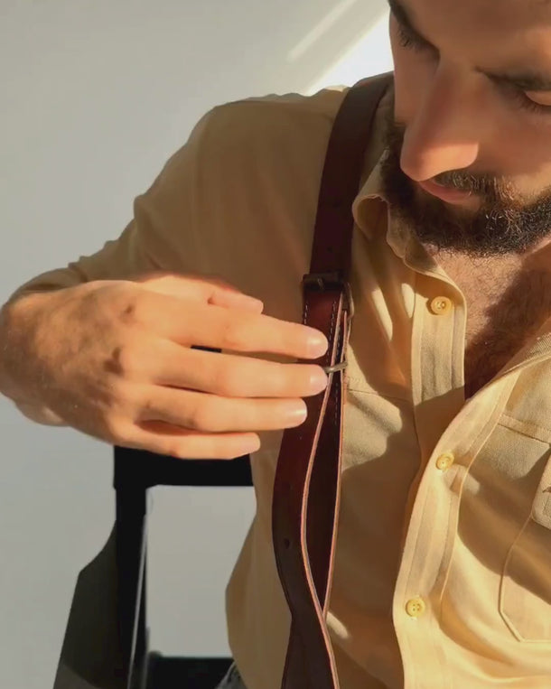 Video showing the Denver handmade leather crossbody bag for men from all angles, including front, back, sides, and details.