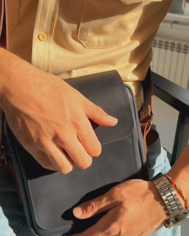 Video showing the Polo handmade leather crossbody bag for men from all angles, including front, back, sides, and details.
